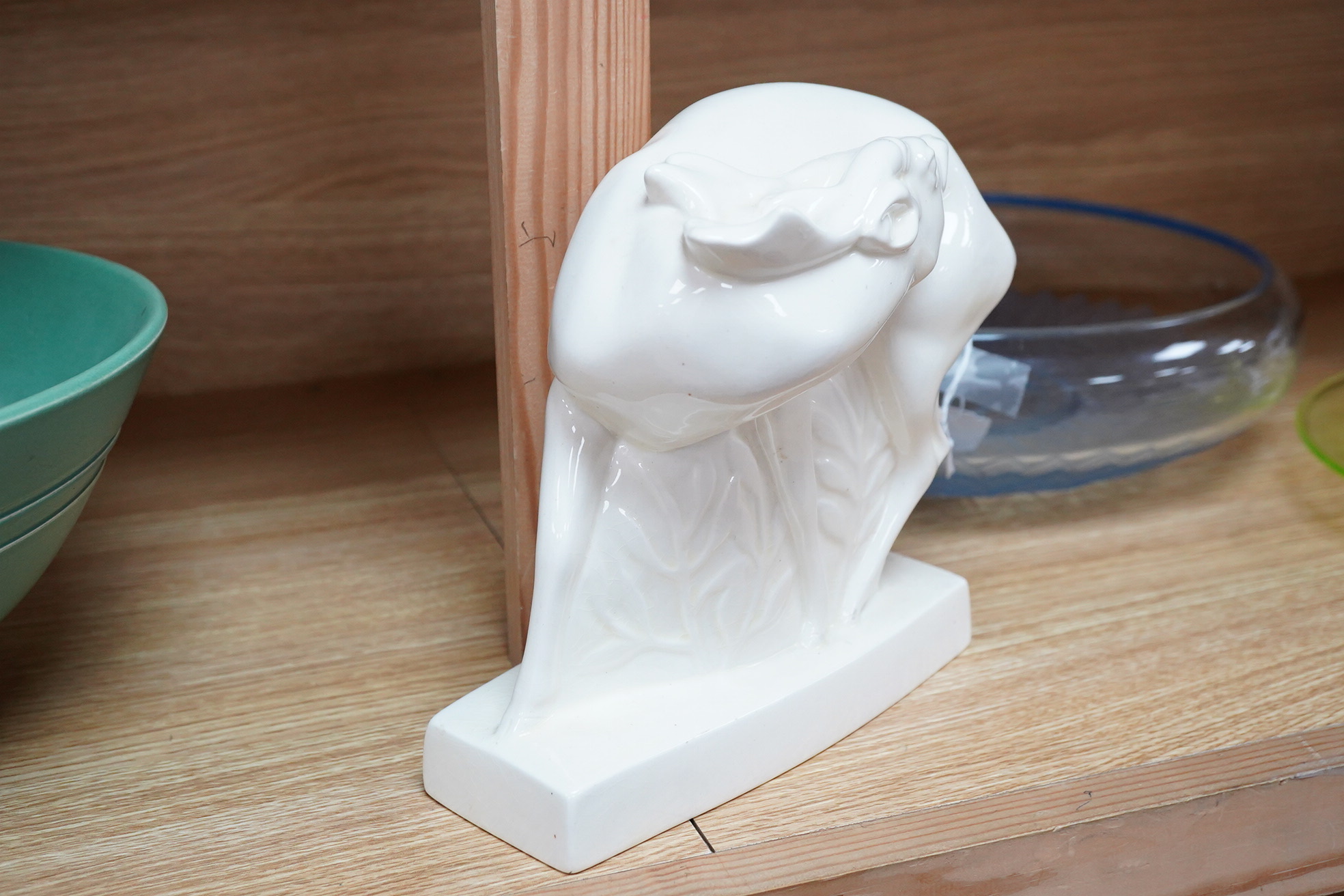 John Skeaping for Wedgwood, an Art deco Fallow deer, cream glazed, 20cm high
